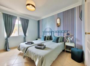 Postel nebo postele na pokoji v ubytování Villa Heaven'a