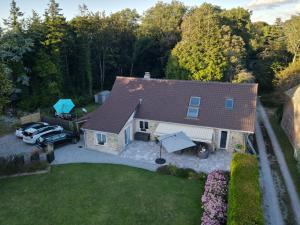 an aerial view of a house with a car parked in the driveway at Le Mas de la Rocherie Chambre d'hôtes "Référence" in Pihen-lès-Guînes