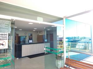 Lobi atau kawasan kaunter penerimaan di Hotel Rota Do Sol