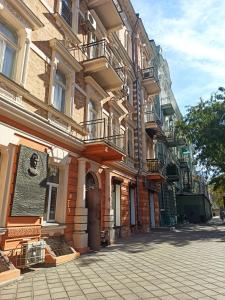 a building with balconies on the side of a street at Re-Ka Luxury Apartments in Odesa