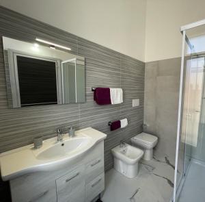 A bathroom at Palazzo degli Artigiani Appartamento in Centro