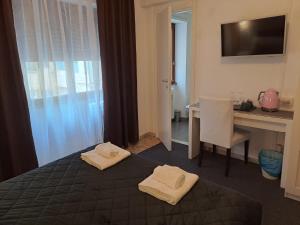 Posteľ alebo postele v izbe v ubytovaní Appia Avenue 639