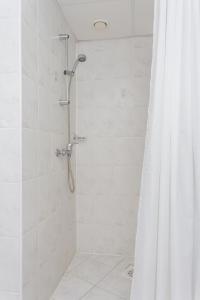 Ванна кімната в Hotel Dzingel