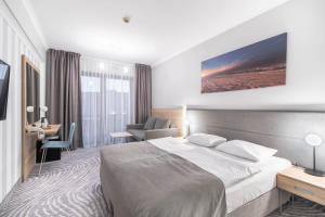 Voodi või voodid majutusasutuse Hotel Leda Spa - Adults Only toas