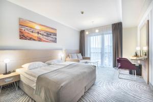 Voodi või voodid majutusasutuse Hotel Leda Spa - Adults Only toas