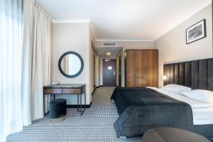 Voodi või voodid majutusasutuse Hotel Leda Spa - Adults Only toas