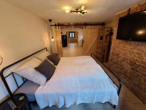 Postel nebo postele na pokoji v ubytování Apartment 22 - zentrumsnah - Parkplatz + 2 fotografie