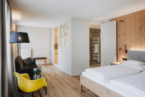 Postel nebo postele na pokoji v ubytování Hotel Alpenrose