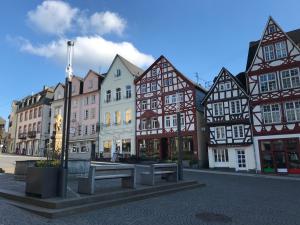a group of buildings on a city street at Erholung im Westerwald ! in Hachenburg