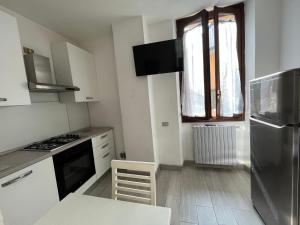 Kuchyň nebo kuchyňský kout v ubytování casa margherita