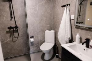 Koupelna v ubytování Hotel OmaBox - Nivala - Oma huoneisto saunalla