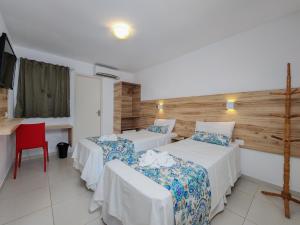 Postel nebo postele na pokoji v ubytování Hotel Refugio