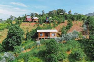 an aerial view of a house on a hill at Năm mùa Bungalows in Hương Hóa