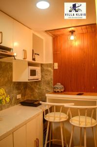 Kuchyň nebo kuchyňský kout v ubytování Tagaytay Cozy Staycation in Villa Kluis Pine Suite