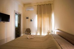 Postel nebo postele na pokoji v ubytování Casa del Mister