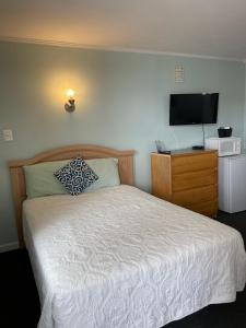 Postel nebo postele na pokoji v ubytování Barcelona Motel