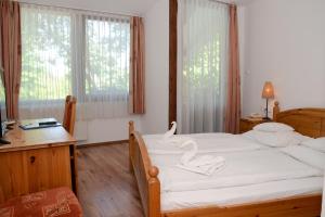 A bed or beds in a room at Hotel ICON