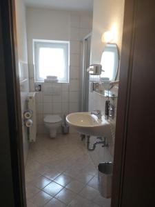 Koupelna v ubytování Hotel Klinger
