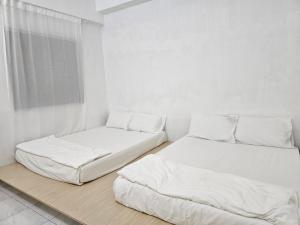 Postel nebo postele na pokoji v ubytování Fukuda Minshuku Japanese style