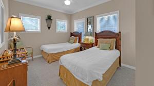 Voodi või voodid majutusasutuse Abode Kenmare - Sleeps 10 with 2 Pools and lots of porches! toas +44 fotot