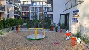 Ο χώρος παιχνιδιού για παιδιά στο Pobierowo Baltic Apartaments D5