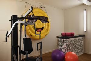 a gym with a smiley face hanging on the wall at Artyster Le Mans in Le Mans