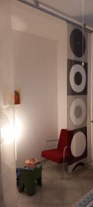 A seating area at CASA APPARTAMENTO VACANZE La fermata delle rondini