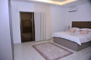 Ένα ή περισσότερα κρεβάτια σε δωμάτιο στο One bedroom apartments