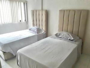 A bed or beds in a room at Depa hermoso en Cd. De México