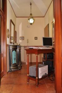 TV o dispositivi per l'intrattenimento presso Giangurgolo B&B
