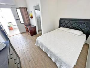 Postel nebo postele na pokoji v ubytování Surf Ranch Tamarindo