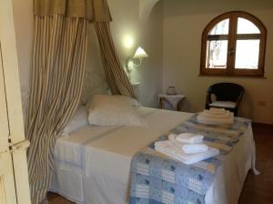 Postel nebo postele na pokoji v ubytování Bed and Breakfast Tenuta Palmieri ONLY ADULT