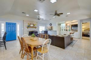 a kitchen and dining room with a table and chairs at Temple Retreat with Cliffside Belton Lake Views! in Temple