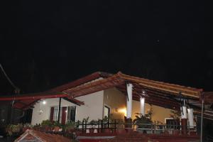 Φωτογραφία από το άλμπουμ του Coorg Northbreeze Estate stay σε Madikeri