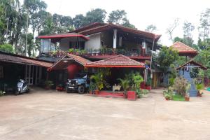 Φωτογραφία από το άλμπουμ του Coorg Northbreeze Estate stay σε Madikeri +60 φωτογραφίες