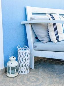 Posteľ alebo postele v izbe v ubytovaní Blue Seaside House with Terrace