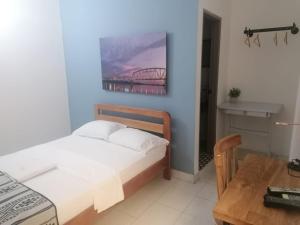 Postel nebo postele na pokoji v ubytování Hotel Casa de las Dos Palmas -Hotel Boutique