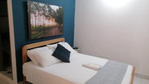 Postel nebo postele na pokoji v ubytování Hotel Casa de las Dos Palmas -Hotel Boutique