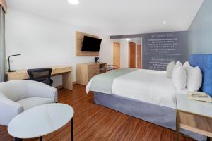Postel nebo postele na pokoji v ubytování TRYP by Wyndham Guayaquil Airport + 27 fotografií