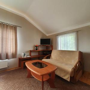 TV a/nebo společenská místnost v ubytování Parks Guest House