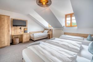Postel nebo postele na pokoji v ubytování Hotel Schaider