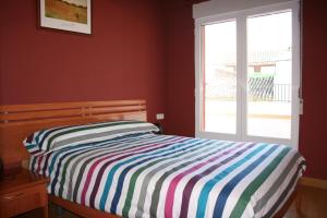 Cama o camas de una habitación en Vivienda Turistica Rural Piskerra