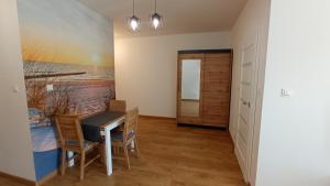 Φωτογραφία από το άλμπουμ του Apartament DOROTA στο Σβινούιστσιε +9 φωτογραφίες