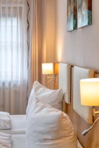 Postel nebo postele na pokoji v ubytování Hotel Schaider
