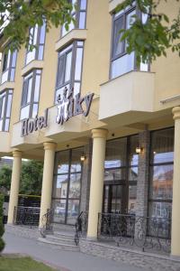 a hotel milley sign on the side of a building at Hotel Miky in Arad