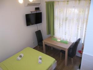 Кровать или кровати в номере Apartment Vrančić