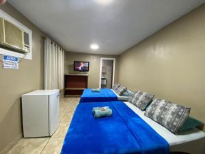 Voodi või voodid majutusasutuse Lurviz Home Suítes toas