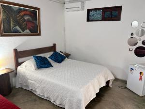 Postel nebo postele na pokoji v ubytování Pousada Estalagem Paraty