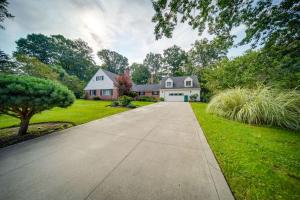 a driveway leading to a house at Richmond Heights Retreat with Patio and Fire Pit! in Richmond Heights