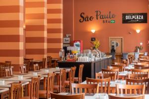 The lounge or bar area at DELPLAZA Excelsior São Paulo - By Monreale